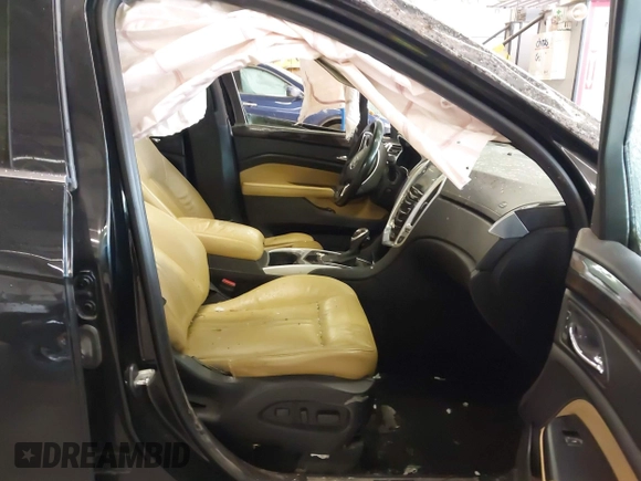 2014 Cadillac SRX Premium Collection with VIN 3GYFNGE35ES636852, listed as a IAAI auction lot 42283604 with 167,983 mi miles and . Bid and sale history available at DreamBid. Image 5.
