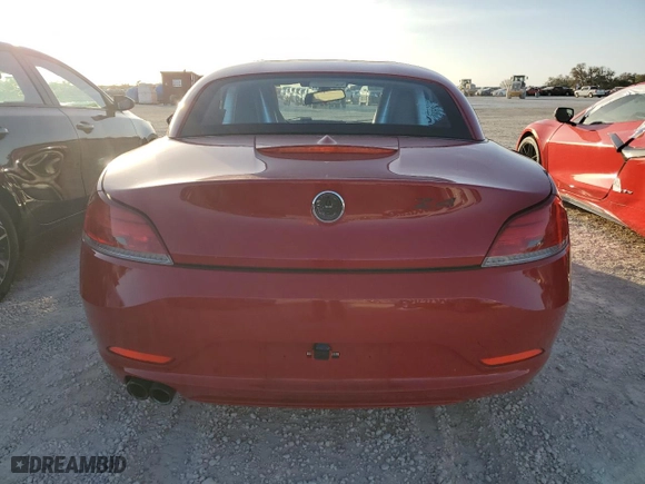 2010 BMW Z4 sDrive30i with VIN WBALM5C55AE377253, listed as a Copart auction lot 74230184 with 0 mi miles and Salvage Title. Bid and sale history available at carsss.com. Image 6.