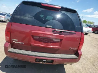 2007 GMC Yukon SLT z VIN 1GKFK13087J294570, wystawiony jako Copart lot #57968375 z przebiegiem 185 186 mil mil oraz Czysty tytuł • Clean title. Historia ofert i sprzedaży dostępna na DreamBid. Obrazek 6.
