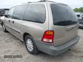 2002 Ford Windstar LX with VIN 2FMZA514X2BA86496, listed as a IAAI auction lot 42044273 with Not Provided miles and . Bid and sale history available at carsss.com. Image 3.