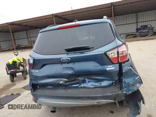2018 Ford Escape SE with VIN 1FMCU0GD0JUC58115, listed as a IAAI auction lot 41578309 with 76,162 mi miles. Bid and sale history available at carsss.com. Image 16.