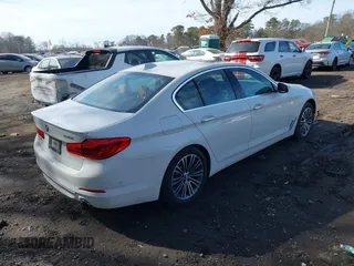 2017 BMW 5 Series 530i xDrive with VIN WBAJA7C36HG906136, listed as a IAAI auction lot 41644019 with 47,144 mi miles and . Bid and sale history available at carsss.com. Image 4.
