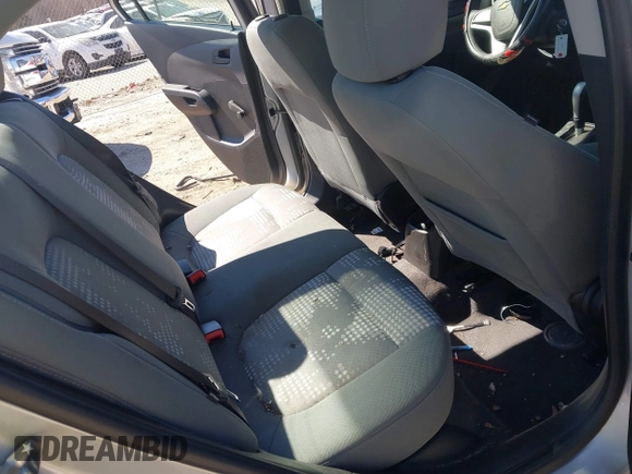 2018 Chevrolet Sonic LS with VIN 1G1JB5SH2J4112817, listed as a IAAI auction lot 41620486 with 60,479 mi miles and . Bid and sale history available at DreamBid. Image 8.