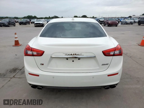 2015 Maserati Ghibli S Q4 with VIN ZAM57RTA2F1134744, listed as a Copart auction lot 63398205 with 61,347 mi miles and Clean title. Bid and sale history available at DreamBid. Image 6.
