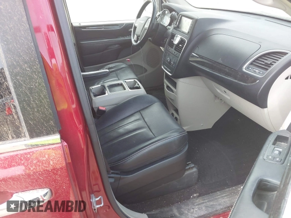 2014 Chrysler Town & Country Touring with VIN 2C4RC1BG9ER418147, listed as a IAAI auction lot 41812594 with 161,356 mi miles and . Bid and sale history available at DreamBid. Image 5.