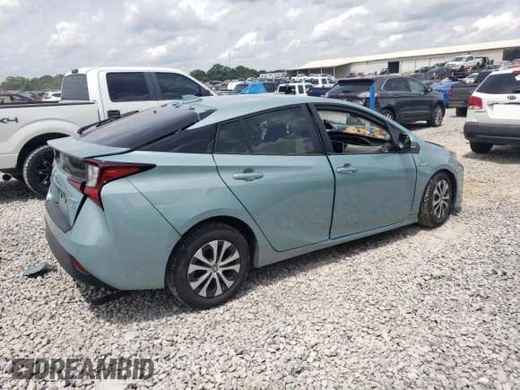 2021 Toyota Prius LE with VIN JTDL9MFUXM3023679, listed as a Copart auction lot 60757645 with Not provided miles and Salvage title. Bid and sale history available at DreamBid. Image 3.