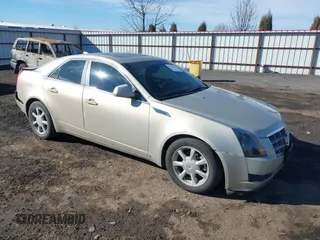 2009 Cadillac CTS AWD w/1SB with VIN 1G6DT57V990107958, listed as a IAAI auction lot 41685415 with 148,294 mi miles. Bid and sale history available at carsss.com. Image 1.