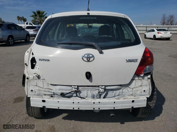 2009 Toyota Yaris with VIN JTDKT903495224256, listed as a Copart auction lot 50065565 with 164,473 mi miles and Salvage Title. Bid and sale history available at carsss.com. Image 6.