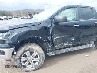 2021 Ford Ranger XL with VIN 1FTER4FH6MLD42153, listed as a IAAI auction lot 41650522 with 77,156 mi miles and . Bid and sale history available at DreamBid. Image 6.