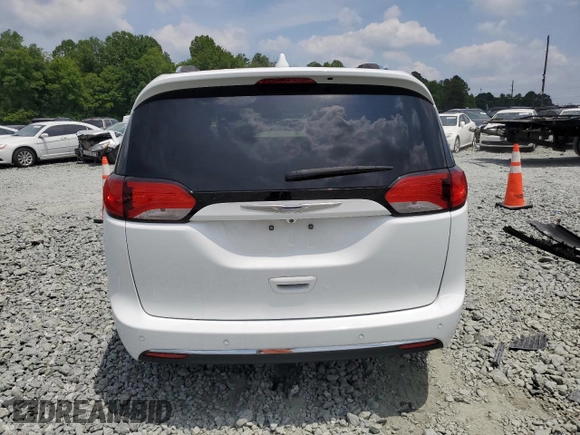2017 Chrysler Pacifica Touring L Plus с VIN 2C4RC1EG2HR833620, выставлен на аукционе Copart как лот 57954605 с пробегом 106 025 миль миль и Списание • Salvage title. История ставок и продаж доступна на DreamBid. Изображение 6.