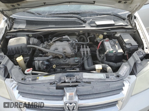 2009 Dodge Grand Caravan SXT z VIN 2D8HN54159R620187, wystawiony jako Copart lot #84703224 z przebiegiem 206 240 mil mil oraz Szkoda całkowita • Salvage title. Historia ofert i sprzedaży dostępna na DreamBid. Obrazek 12.