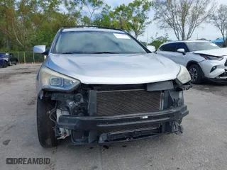 2014 Hyundai Santa Fe Sport with VIN 5XYZU3LB0EG198641, listed as a IAAI auction lot 41673814 with 113,027 mi miles. Bid and sale history available at carsss.com. Image 6.