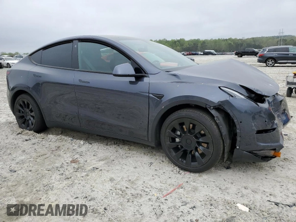 2021 Tesla Model Y Long Range z VIN 5YJYGDEE0MF254020, wystawiony jako Copart lot #51666865 z przebiegiem 25 805 mil mil oraz Szkoda całkowita • Salvage title. Historia ofert i sprzedaży dostępna na DreamBid. Obrazek 4.