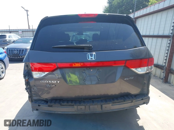2014 Honda Odyssey Touring with VIN 5FNRL5H99EB075979, listed as a IAAI auction lot 42520154 with 99,314 mi miles and . Bid and sale history available at DreamBid. Image 19.