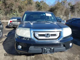2010 Honda Pilot Touring with VIN 5FNYF4H95AB030531, listed as a IAAI auction lot 41441088 with 274,185 mi miles and . Bid and sale history available at carsss.com. Image 12.