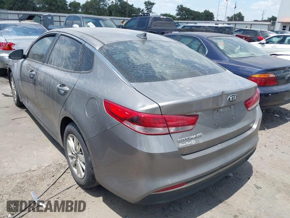 2016 Kia Optima LX with VIN 5XXGT4L32GG073267, listed as a IAAI auction lot 37153293 with 193,858 mi miles. Bid and sale history available at carsss.com. Image 3.