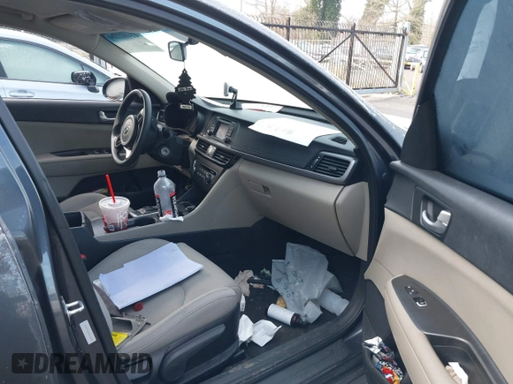 2017 Kia Optima LX with VIN 5XXGT4L32HG156845, listed as a IAAI auction lot 41402224 with 126,529 mi miles. Bid and sale history available at carsss.com. Image 5.