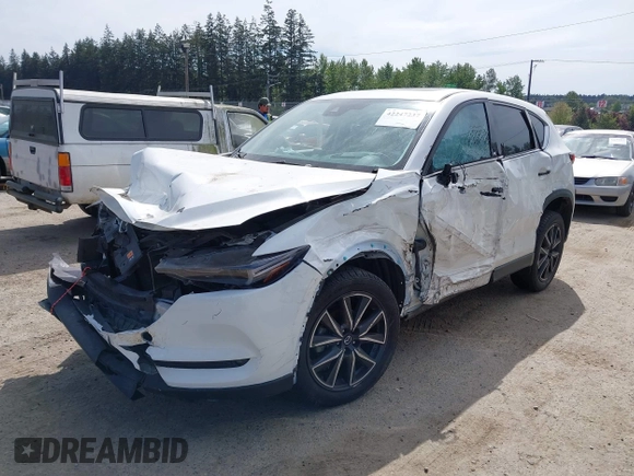 2018 Mazda CX-5 Grand Touring with VIN JM3KFBDM1J0309260, listed as a IAAI auction lot 42247237 with Not Provided miles and . Bid and sale history available at DreamBid. Image 6.