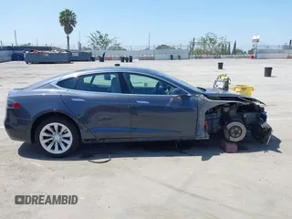 2016 Tesla Model S 90D with VIN 5YJSA1E22GF138236, listed as a IAAI auction lot 42532245 with 72,839 mi miles and . Bid and sale history available at DreamBid. Image 14.