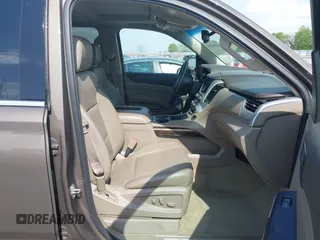 2016 GMC Yukon SLT with VIN 1GKS1BKC9GR328861, listed as a IAAI auction lot 42010839 with 200,711 mi miles. Bid and sale history available at carsss.com. Image 5.