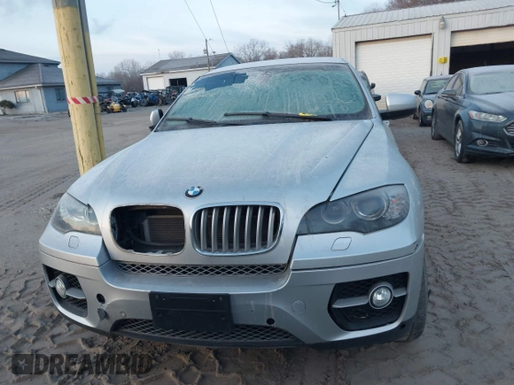 2012 BMW X6 50i z VIN 5UXFG8C58CL590171, wystawiony jako IAAI lot #41087730 z przebiegiem 83 143 mil mil oraz . Historia ofert i sprzedaży dostępna na DreamBid. Obrazek 12.