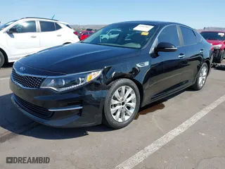 2016 Kia Optima EX with VIN 5XXGU4L38GG032056, listed as a IAAI auction lot 42013867 with 145,466 mi miles. Bid and sale history available at carsss.com. Image 17.