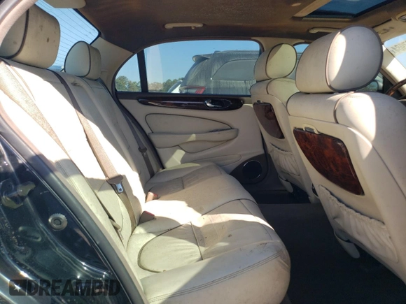 2006 Jaguar XJ Vanden Plas with VIN SAJWA82B96SH10259, listed as a Copart auction lot 77697984 with 0 mi miles and Clean Title. Bid and sale history available at carsss.com. Image 10.