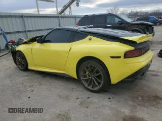 2023 Nissan Z Proto Spec z VIN JN1BZ4BHXPM310509, wystawiony jako Copart lot #87073274 z przebiegiem 5679 mil mil oraz Szkody całkowita. Historia ofert i sprzedaży dostępna na DreamBid. Obrazek 2.