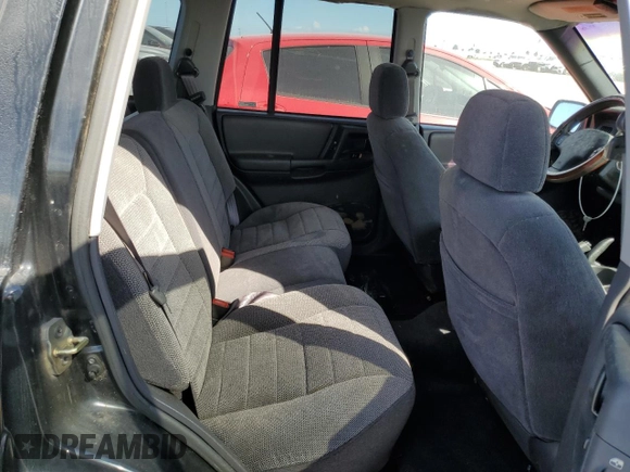 1998 Jeep Grand Cherokee Laredo with VIN 1J4GZ48Y7WC321234, listed as a Copart auction lot 75438624 with 0 mi miles and Salvage Title. Bid and sale history available at carsss.com. Image 11.