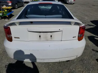 2000 Toyota Celica GT with VIN JTDDR32TXY0025709, listed as a Copart auction lot 46736585 with 184,635 mi miles and Salvage Title. Bid and sale history available at carsss.com. Image 6.