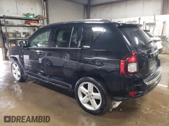 2014 Jeep Compass Latitude with VIN 1C4NJCEA2ED887736, listed as a Copart auction lot 51675375 with 103,403 mi miles and Salvage Title. Bid and sale history available at carsss.com. Image 2.