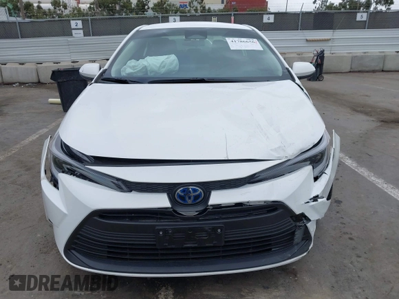 2023 Toyota Corolla Hybrid LE with VIN JTDBCMFE3PJ010097, listed as a IAAI auction lot 41786656 with 50,775 mi miles. Bid and sale history available at carsss.com. Image 12.