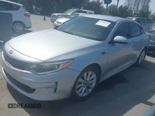 2018 Kia Optima LX with VIN 5XXGT4L31JG267716, listed as a IAAI auction lot 41890611 with 63,491 mi miles and . Bid and sale history available at carsss.com. Image 17.