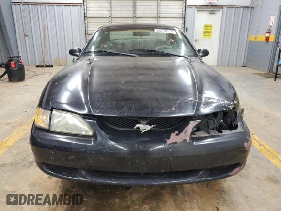 1997 Ford Mustang GT with VIN 1FALP42X4VF192088, listed as a Copart auction lot 84714114 with 194,845 mi miles and Salvage title. Bid and sale history available at DreamBid. Image 5.