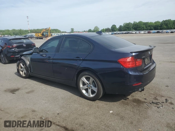 2013 BMW 3 Series 328i xDrive with VIN WBA3B5C52DJ599198, listed as a Copart auction lot 56463365 with 98,808 mi miles and Salvage title. Bid and sale history available at DreamBid. Image 2.
