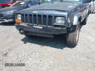 2001 Jeep Cherokee Sport z VIN 1J4FF48S71L572604, wystawiony jako IAAI lot #42817599 z przebiegiem 212 774 mil mil oraz . Historia ofert i sprzedaży dostępna na DreamBid. Obrazek 6.