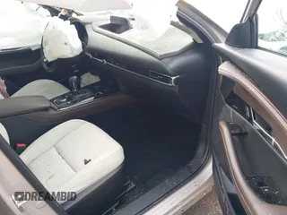 2023 Mazda CX-30 S Premium with VIN 3MVDMBDMXPM563500, listed as a IAAI auction lot 42092423 with 9,148 mi miles and . Bid and sale history available at DreamBid. Image 5.