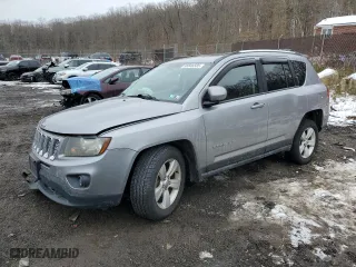 2014 Jeep Compass Latitude with VIN 1C4NJDEB0ED731130, listed as a Copart auction lot 88846585 with 155,579 mi miles and Salvage Title. Bid and sale history available at carsss.com. Image 1.