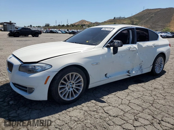 2013 BMW 5 Series 535i with VIN WBAFR7C56DC823291, listed as a Copart auction lot 56621415 with 100,423 mi miles and Salvage title. Bid and sale history available at DreamBid. Image 1.