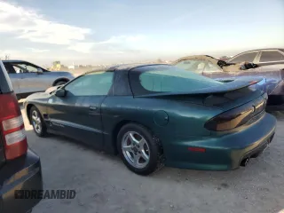 2000 Pontiac Firebird Formula z VIN 2G2FV22G2Y2160915, wystawiony jako Copart lot #76196454 z przebiegiem Nie podano mil oraz Czysty tytuł • Clean title. Historia ofert i sprzedaży dostępna na DreamBid. Obrazek 2.