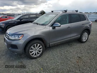 2011 Volkswagen Touareg Sport with VIN WVGFF9BP5BD005113, listed as a Copart auction lot 49249885 with 174,280 mi miles and Clean Title. Bid and sale history available at DreamBid. Image 1.