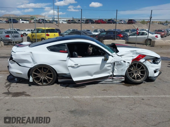 2016 Ford Mustang GT with VIN 1FA6P8CFXG5299021, listed as a IAAI auction lot 42182362 with 129,709 mi miles and . Bid and sale history available at DreamBid. Image 13.
