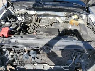 2014 Ford F-150 XL with VIN 1FTFW1EF5EKE57295, listed as a Copart auction lot 61687195 with 123,852 mi miles and Salvage title. Bid and sale history available at DreamBid. Image 11.