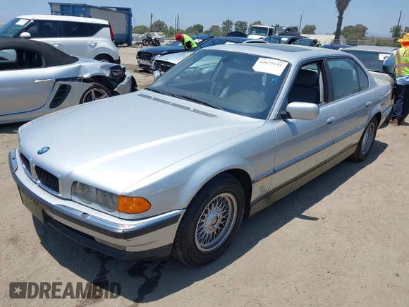2000 BMW 7 Series 740iL with VIN WBAGH8341YDP14211, listed as a IAAI auction lot 42671152 with 247,472 mi miles and . Bid and sale history available at DreamBid. Image 2.