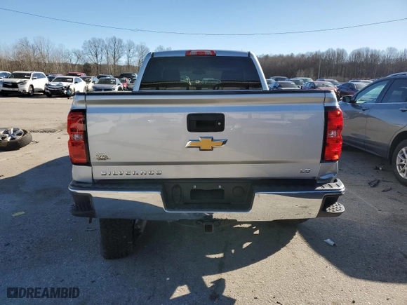 2019 Chevrolet Silverado 1500 LD LT with VIN 2GCVKPECXK1142696, listed as a Copart auction lot 37693144 with 69,751 mi miles and Salvage Title. Bid and sale history available at carsss.com. Image 6.