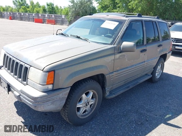 1996 Jeep Grand Cherokee Limited with VIN 1J4GZ78Y1TC162546, listed as a IAAI auction lot 42612646 with 204,098 mi miles and . Bid and sale history available at DreamBid. Image 2.