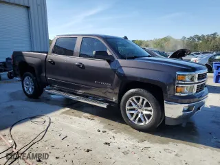 2015 Chevrolet Silverado 1500 LT with VIN 3GCUKREC4FG484813, listed as a Copart auction lot 49317495 with 148,409 mi miles and Salvage Title. Bid and sale history available at carsss.com. Image 4.