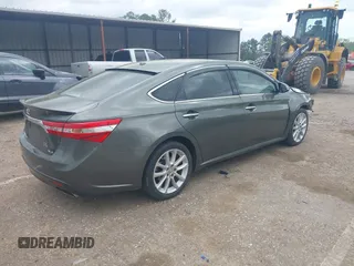 2013 Toyota Avalon XLE with VIN 4T1BK1EBXDU067394, listed as a IAAI auction lot 41944775 with 146,216 mi miles and . Bid and sale history available at DreamBid. Image 4.
