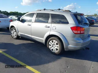 2016 Dodge Journey SE with VIN 3C4PDCAB2GT194810, listed as a IAAI auction lot 41559149 with 104,551 mi miles and . Bid and sale history available at DreamBid. Image 3.