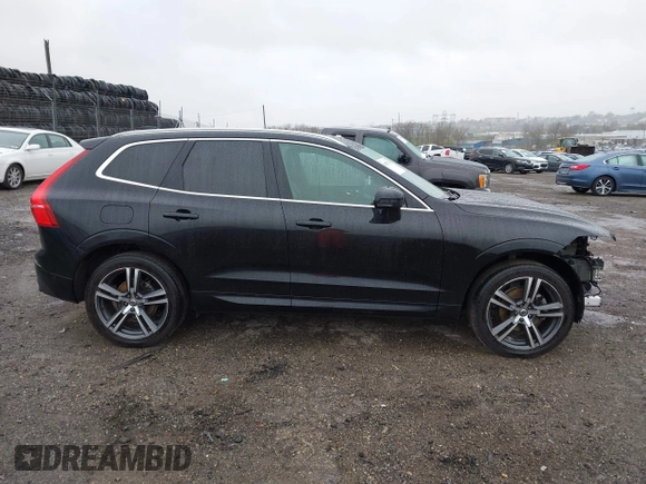 2019 Volvo XC60 Momentum z VIN LYV102RK9KB297120, wystawiony jako IAAI lot #41957299 z przebiegiem 71 402 mil mil oraz . Historia ofert i sprzedaży dostępna na DreamBid. Obrazek 14.